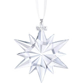 Swarovski Bring some festive elegance into your home this Christmas with this ornament. Exquisitely crafted in clear crystal, this star design creates an impressive sparkle. <strong></strong></span>Use it to decorate your Christmas tree or festive table, hang it in a window for amazing light reflections, or present it on the Christmas Ornament Home Display (available for purchase separately). An ideal gift. Decoration object. Not a toy. Not suitable for children under 15. Dalmazio Design